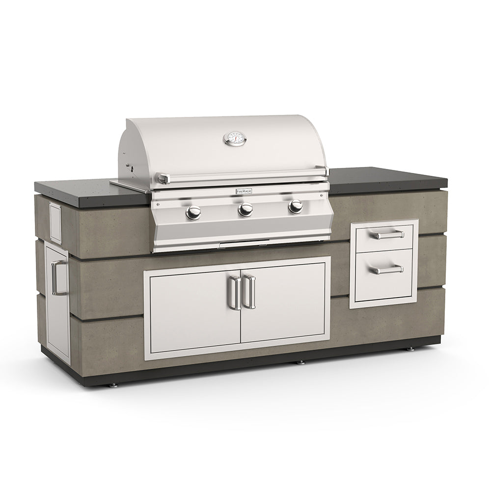Outdoor kitchen grill island with built-in gas grill, doors, and drawers; stainless accents