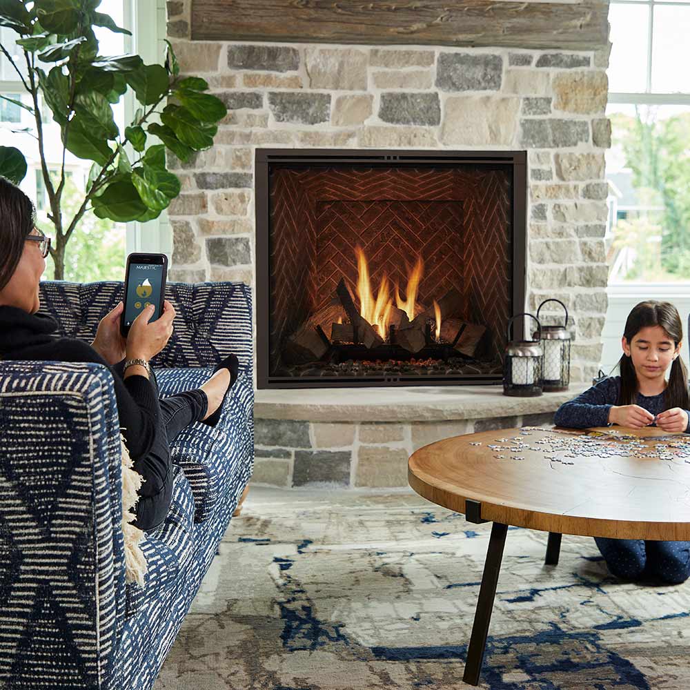 Smartphone showing fireplace control app for flame and settings