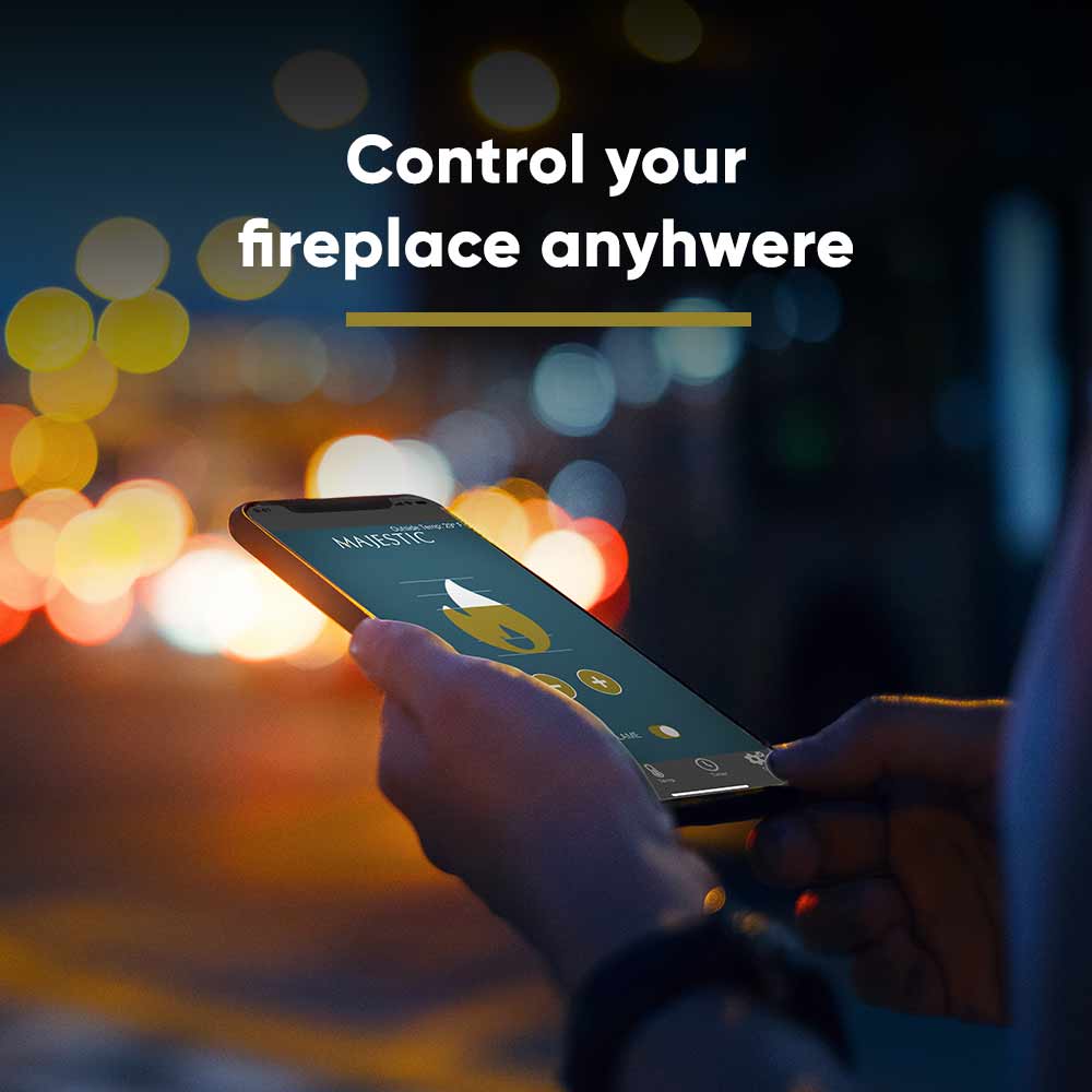 Smartphone held with fireplace remote app screen and flame icon