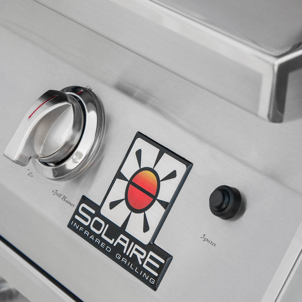 Stainless grill control panel with Solaire infrared label and two control knobs