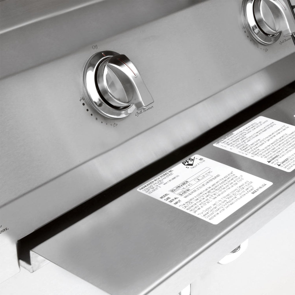 Stainless grill front control area with two knobs and safety rating labels