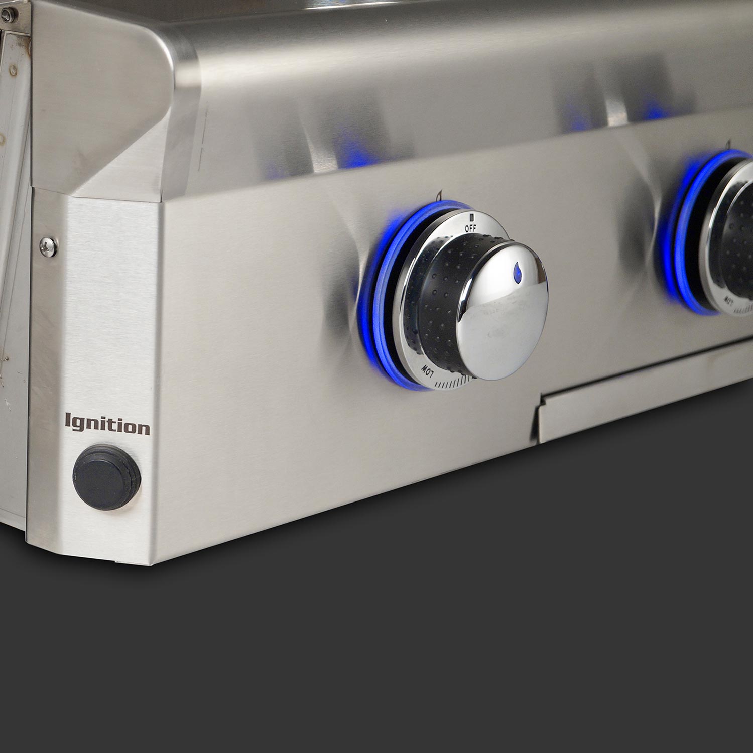 Stainless grill control panel with blue-accented ignition knobs