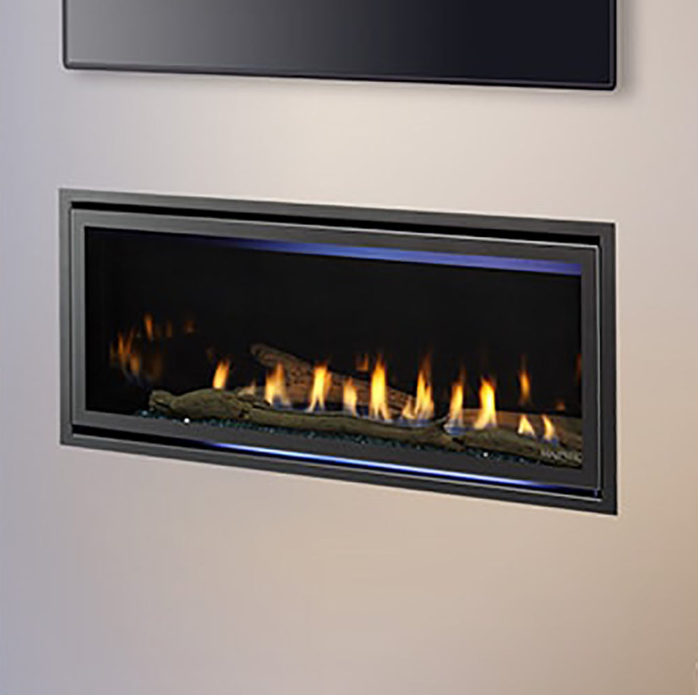 Direct vent gas fireplace close-up showing flames through black-framed glass