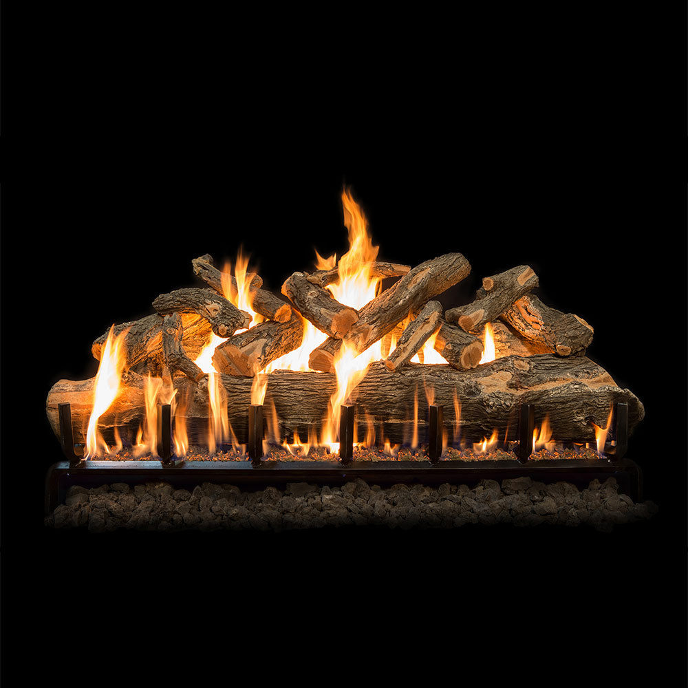 Weathered oak gas log set with realistic flames on ember bed