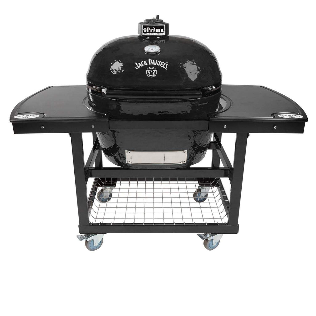 Oval ceramic charcoal kamado grill on wheeled cart with lower cooking grate