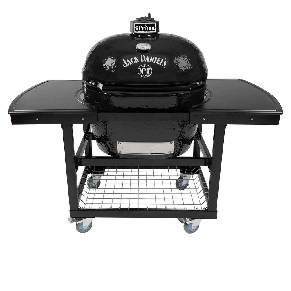 Oval ceramic charcoal kamado grill on wheeled cart with lid and lower grate
