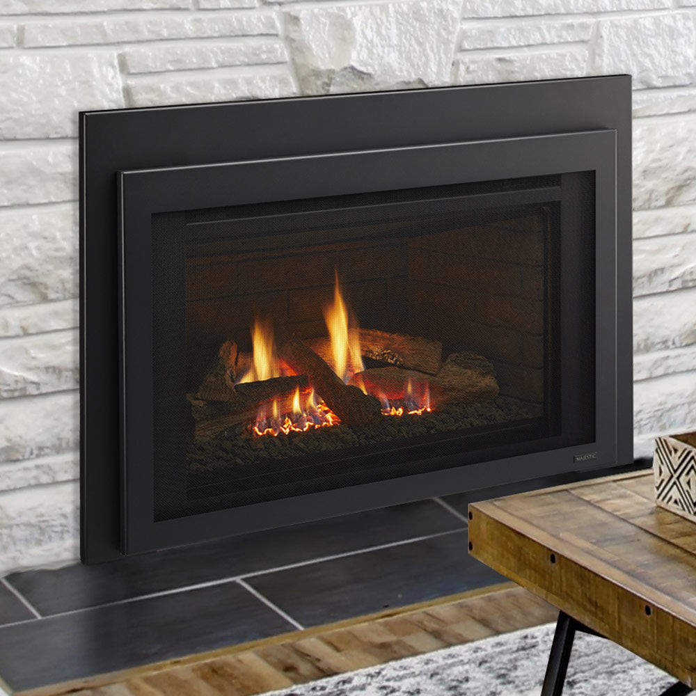 Black direct vent gas fireplace insert with glass front and visible flames