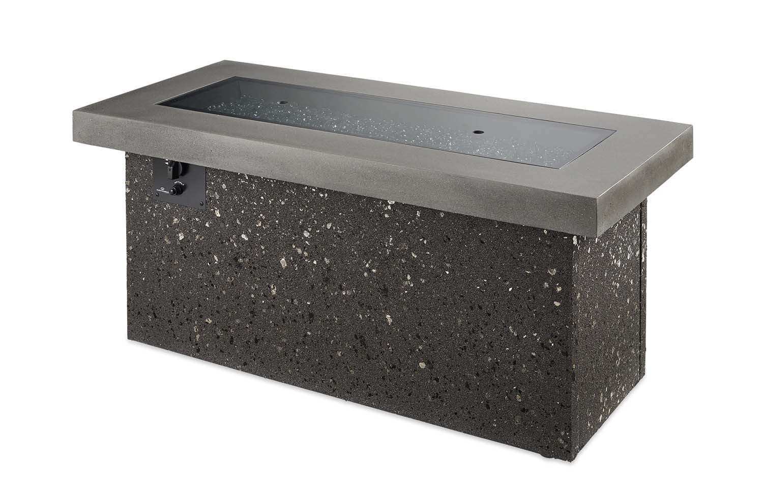 Outdoor gas fire pit with dark speckled rectangular base and empty black firebox