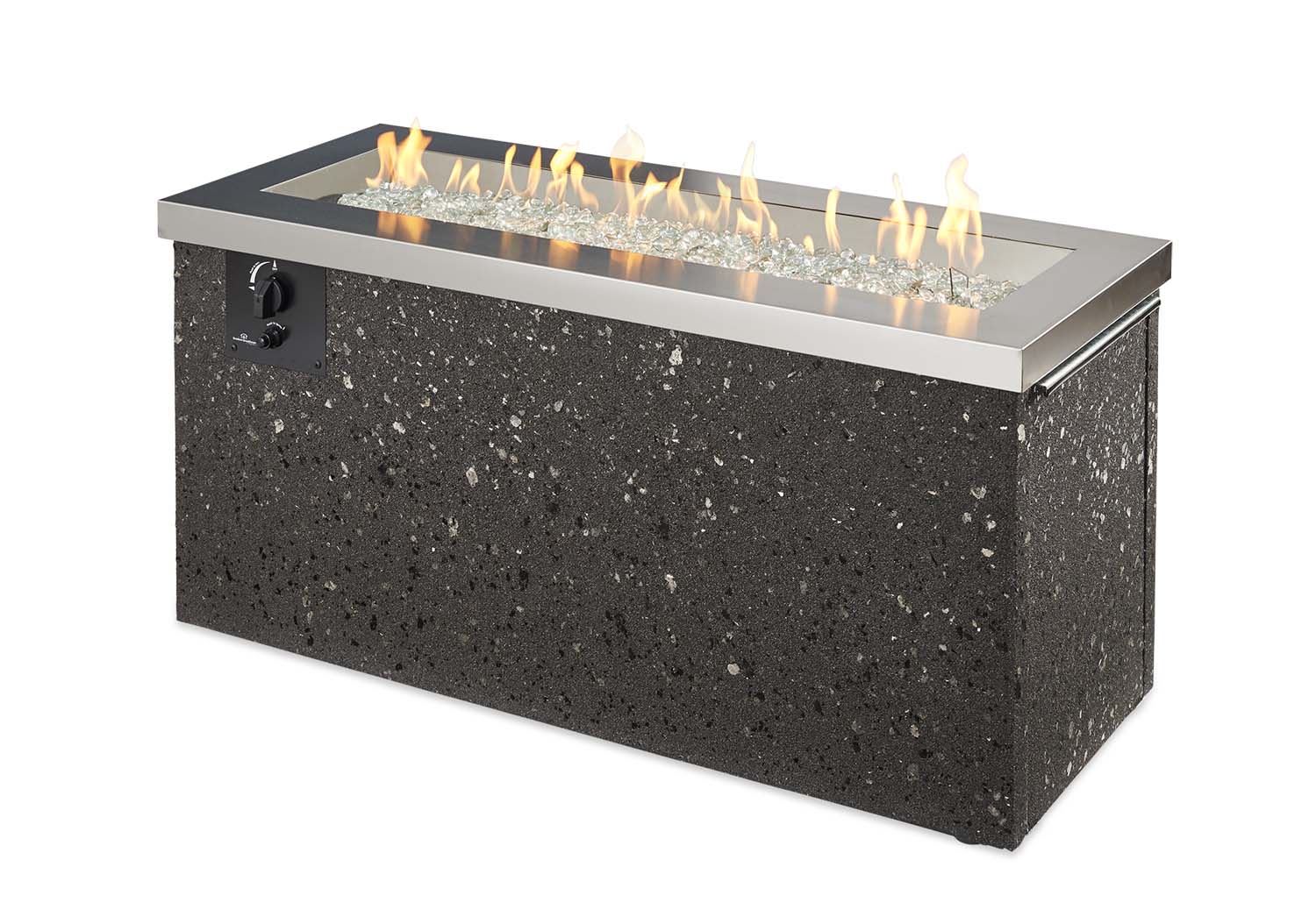 Outdoor gas fire pit with black speckled stone body, stainless rim, and burning flames