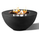 Round fire pit with dark charcoal bowl and visible flames in a metal burner ring