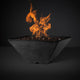 Gray speckled square fire pit with flames and black lava rocks in the bowl