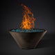 Round fire pit bowl with orange flames and blue glass burner, bronze