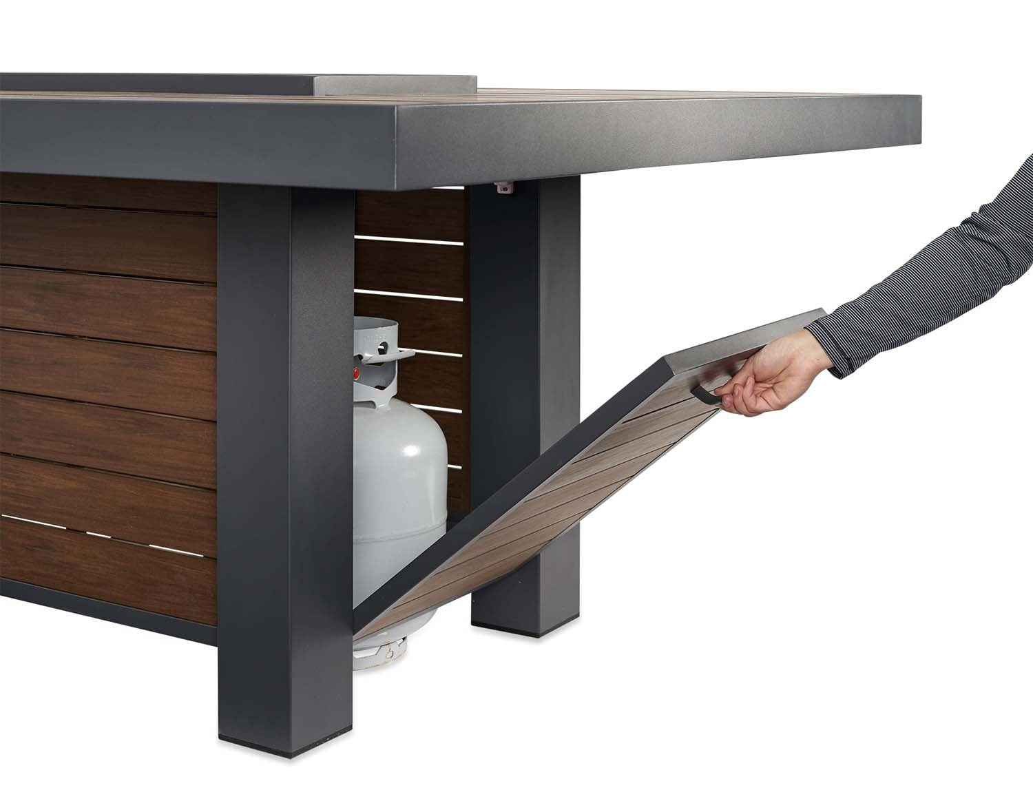 Gas fire pit table with side access panel open, showing propane tank and controls