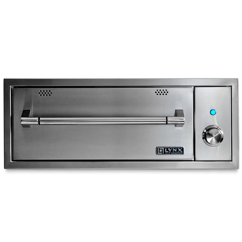 Built-in warming drawer with stainless face, vented interior, and temperature control knob