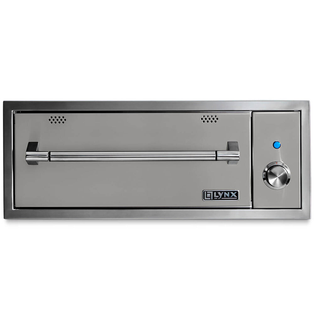 Built-in warming drawer with gray interior panel, vented slots, and temperature knob