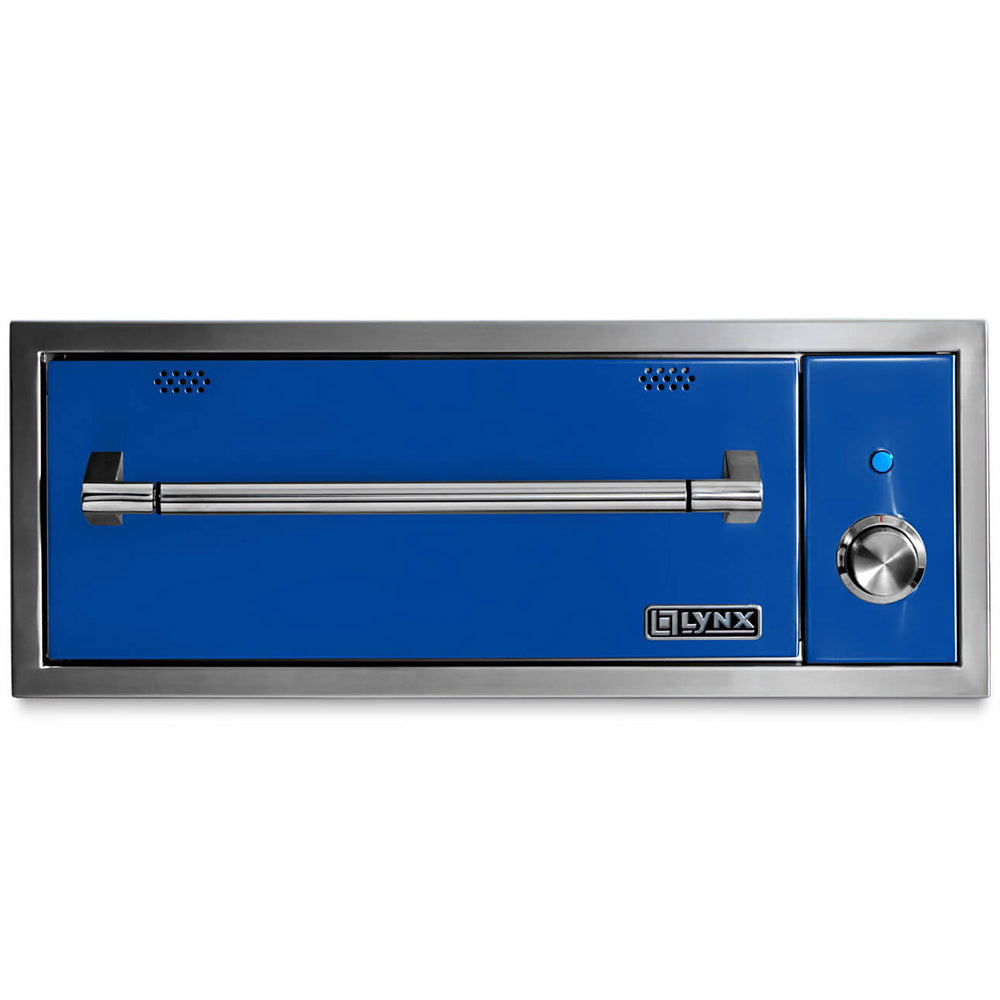 Built-in warming drawer with blue interior panel, vent holes, and round temperature control