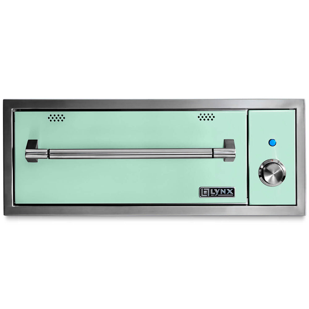 Lynx built-in warming drawer with green front, control knob and blue indicator light