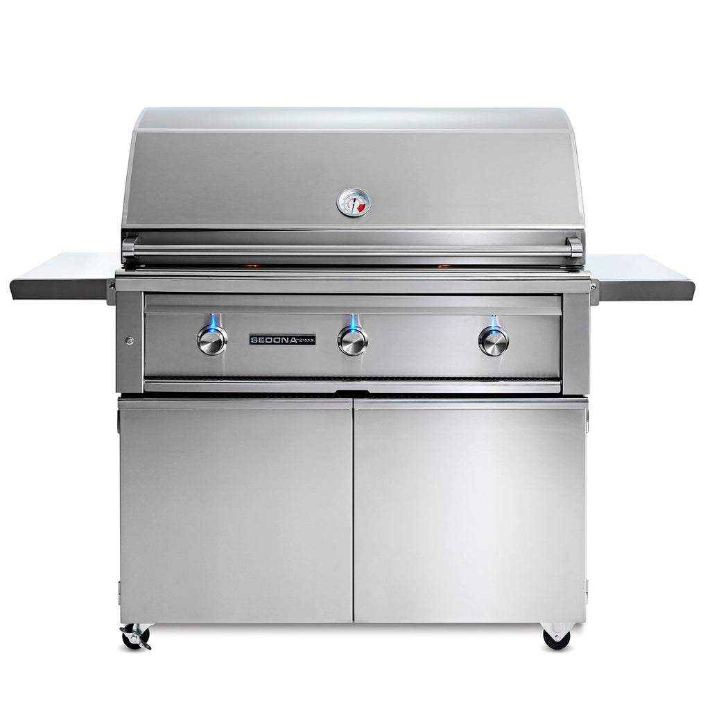Stainless gas grill on cart with closed lid and three front control knobs
