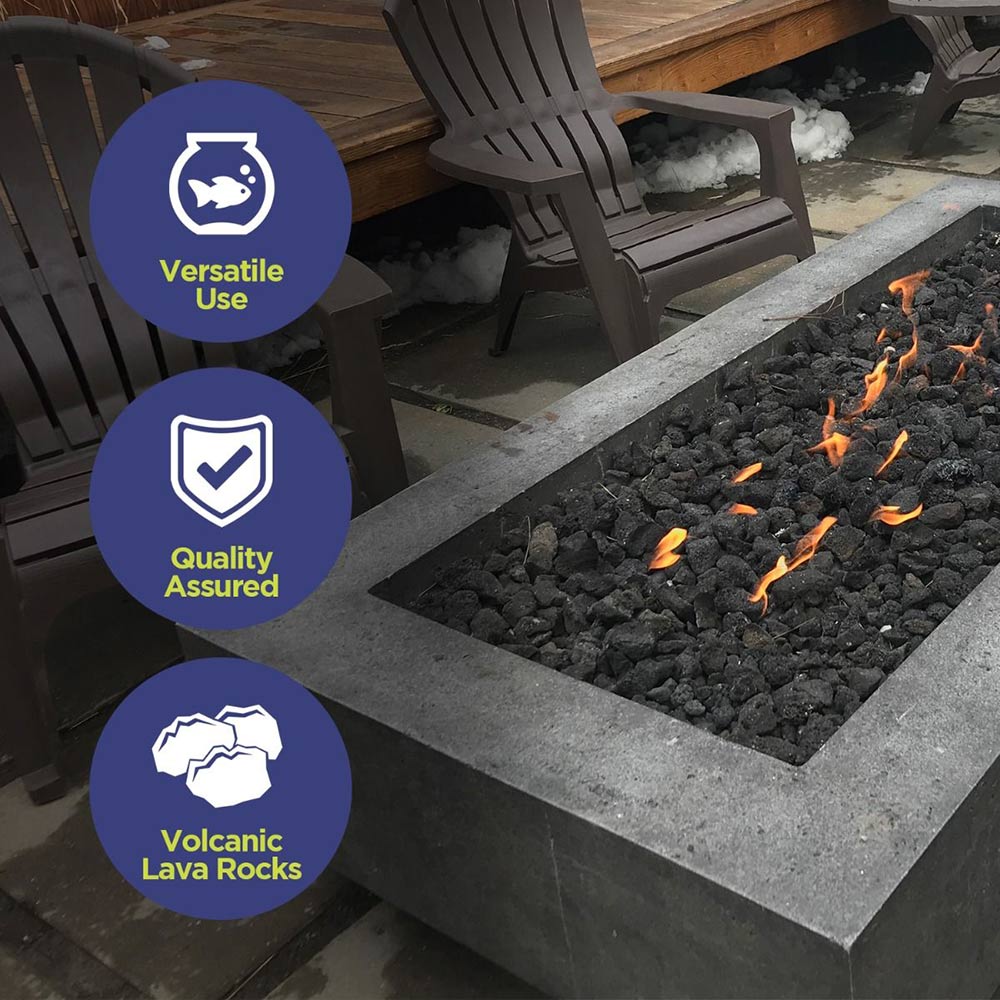 Lava rocks in a rectangular fire bowl with flames and glowing embers