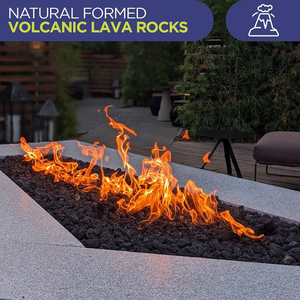 Outdoor firepit with black lava rock bed and tall flames