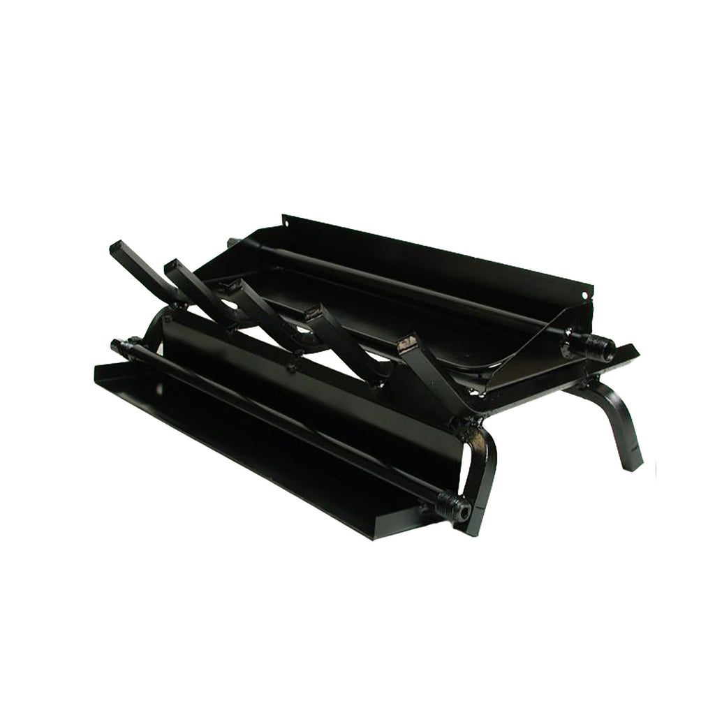 Black fireplace log set with installed grate and side gas manifold