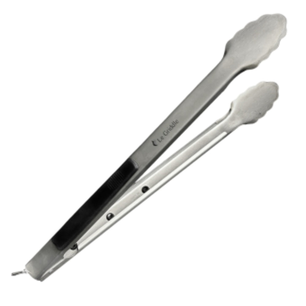 Large stainless steel cooking tongs with black non-slip grip and scalloped ends