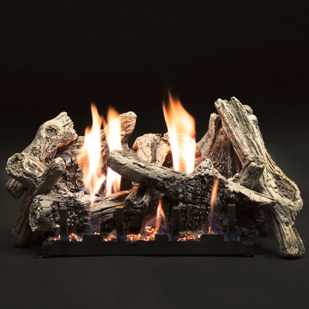 Gas fireplace log set, driftwood-style logs with visible flames