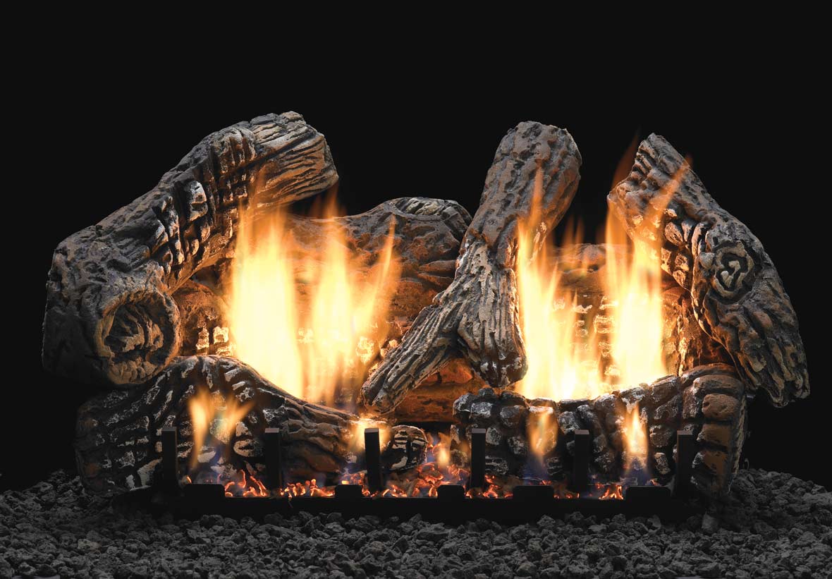 Gas log set with super charred oak logs and visible flames