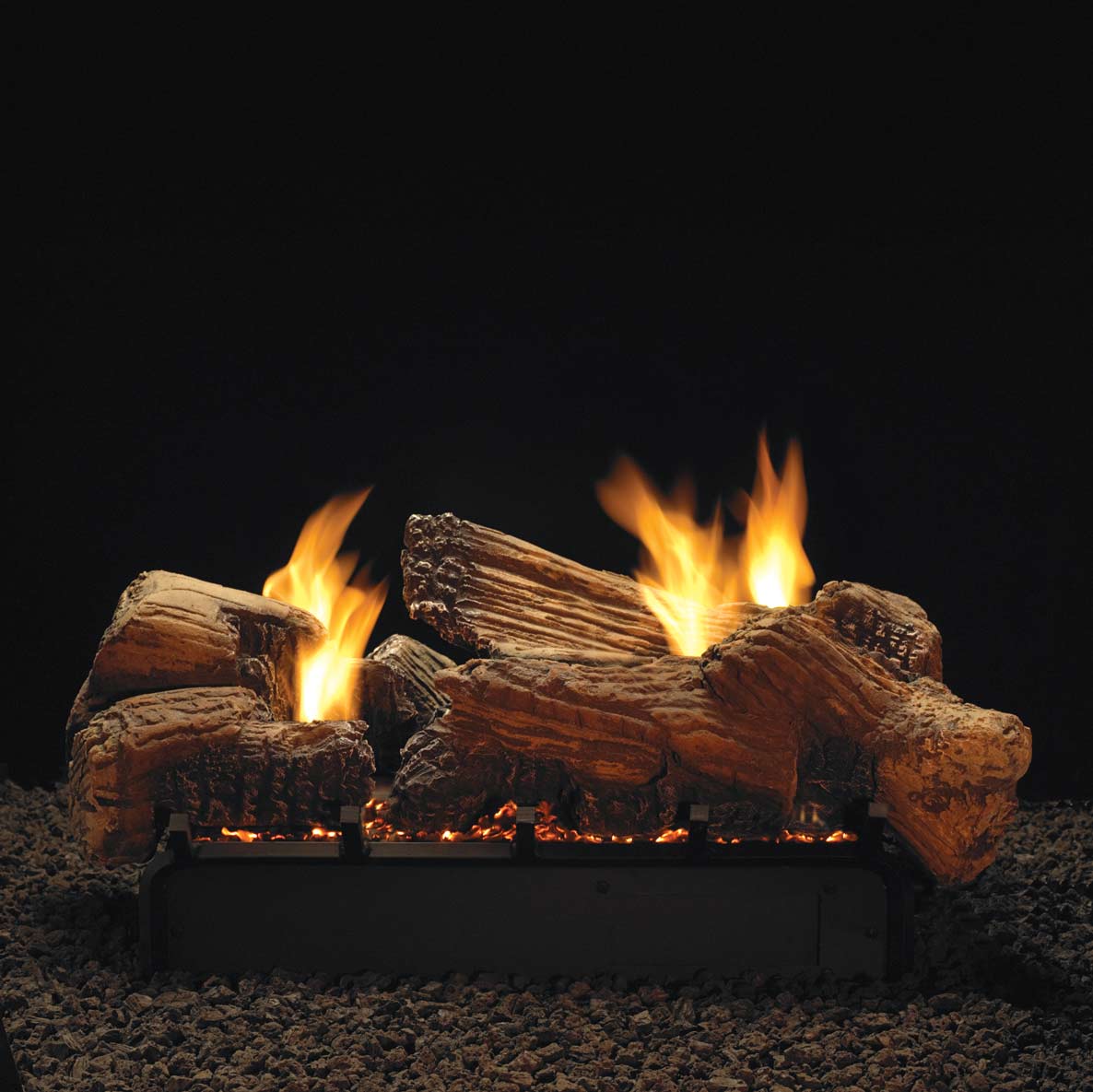 Ceramic fiber fireplace log set with glowing flames and dark brown split logs