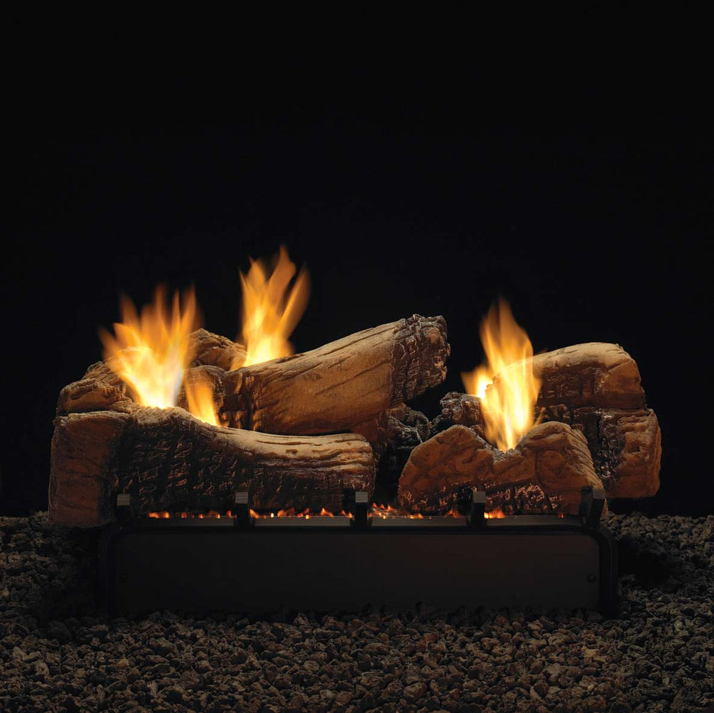 Gas log set with multiple faux log rounds, bright flames across dark brown logs