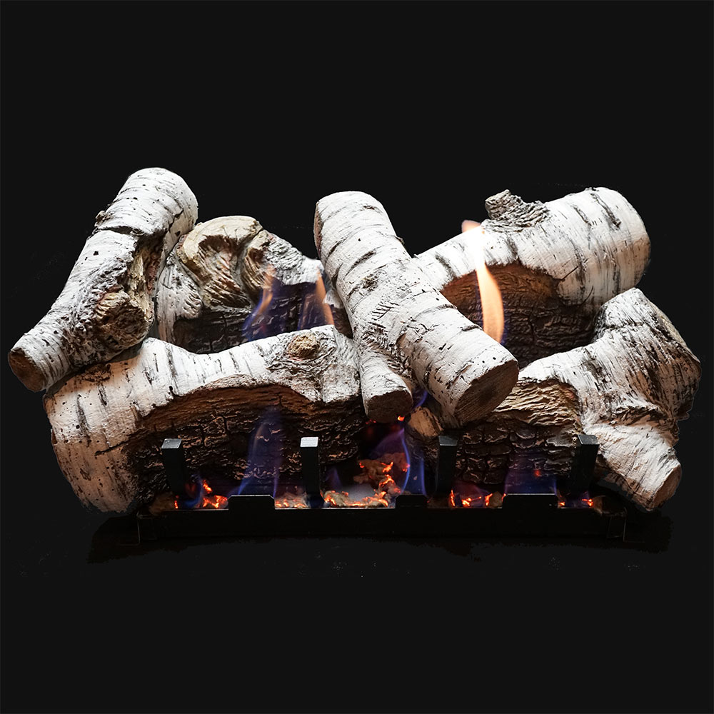 White birch gas log set with glowing flames and ember bed