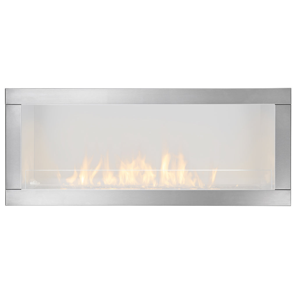 Brushed stainless steel four-sided trim frame with flames visible through opening