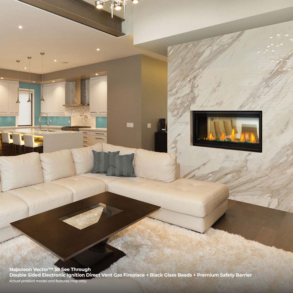 Built-in gas fireplace in living room, flames visible in black-framed glass