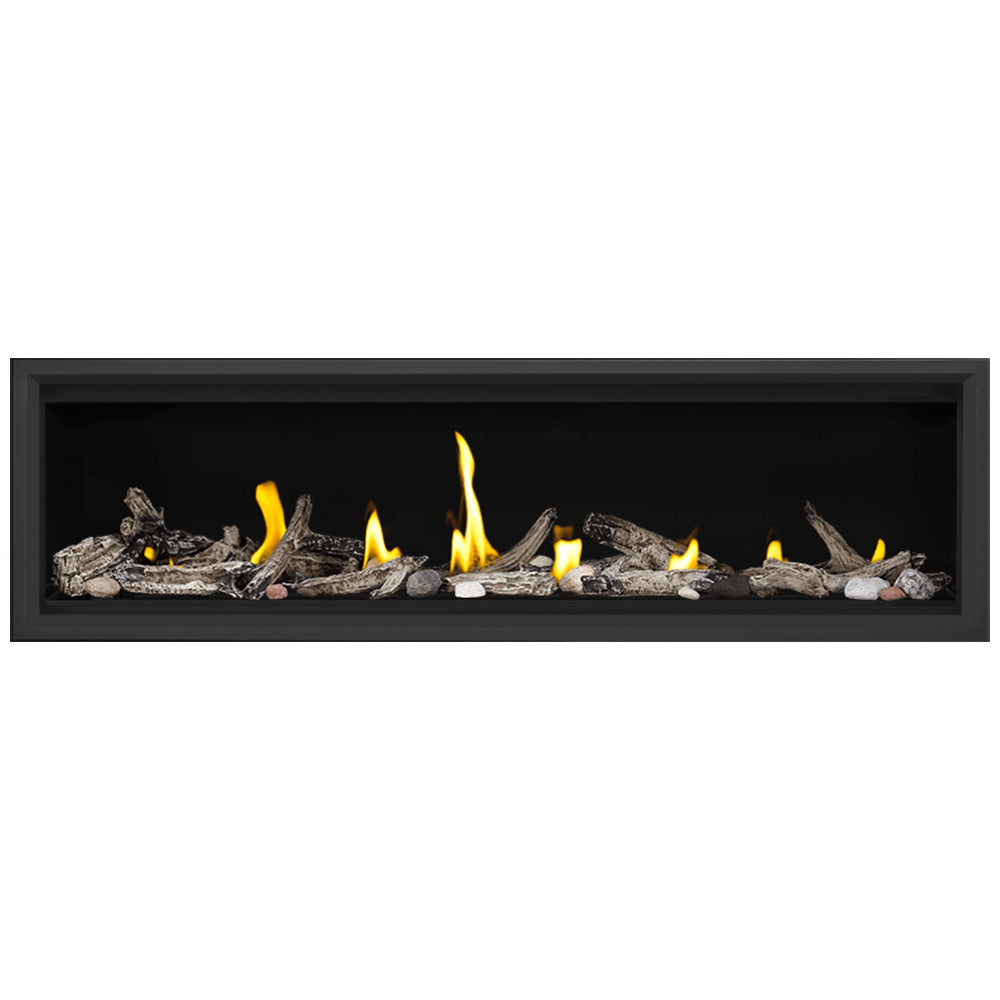 Wall-mounted gas fireplace insert with black frame, flames, and stacked logs on rocks