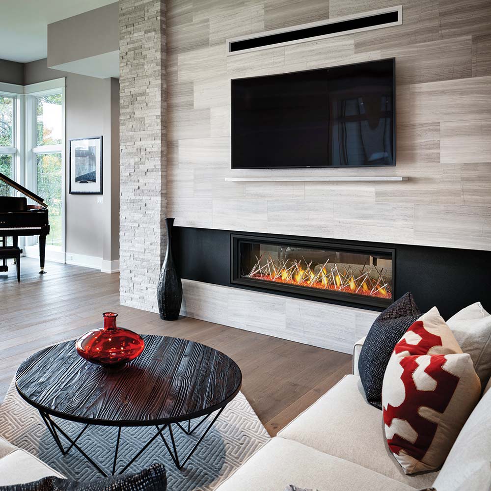 Wall-mounted Napoleon gas fireplace with black surround and lit burner flames