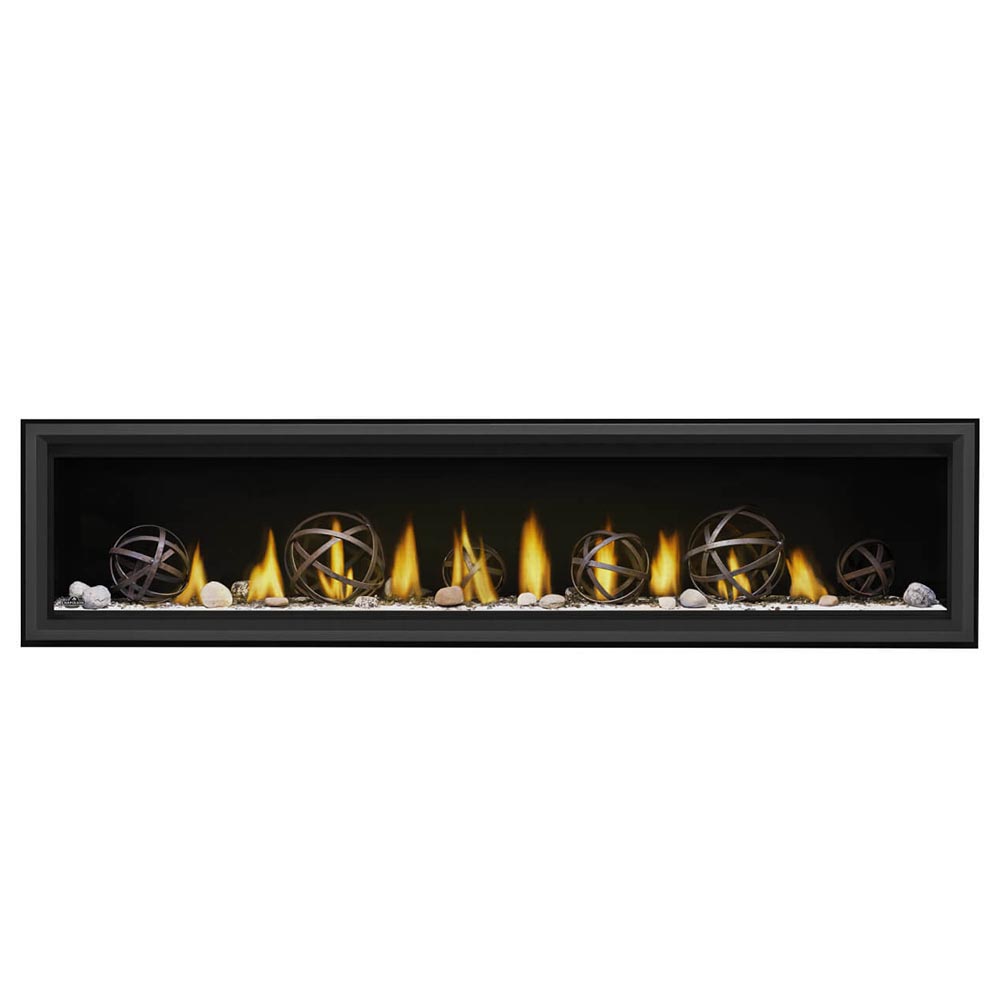 Gas fireplace insert with lit flames, metal ring log decor, and gray stones in black frame