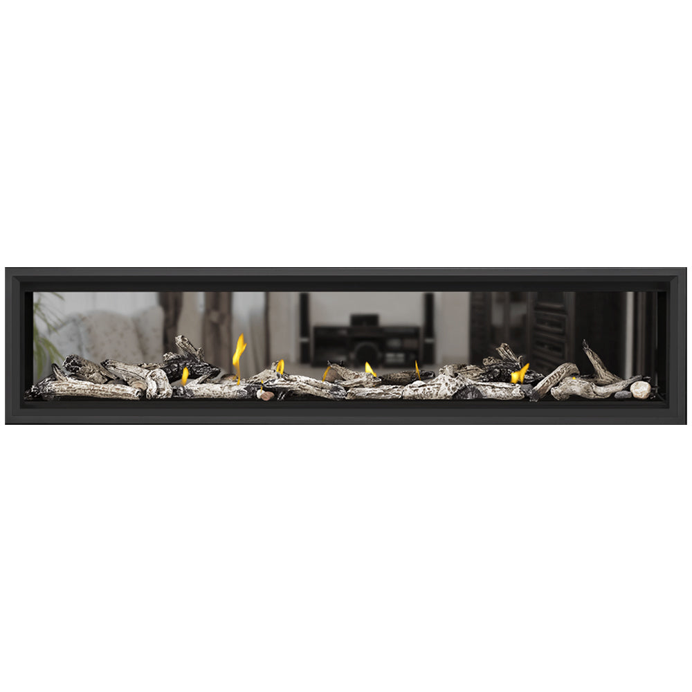 Black-framed direct vent gas fireplace with dark rock media and burning flames