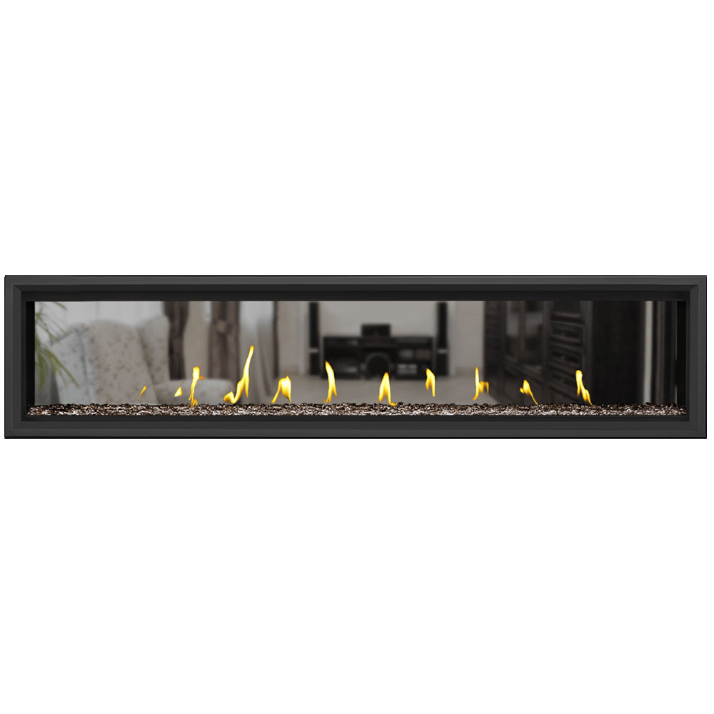 Black-framed direct vent gas fireplace with burning flames over dark rock bed