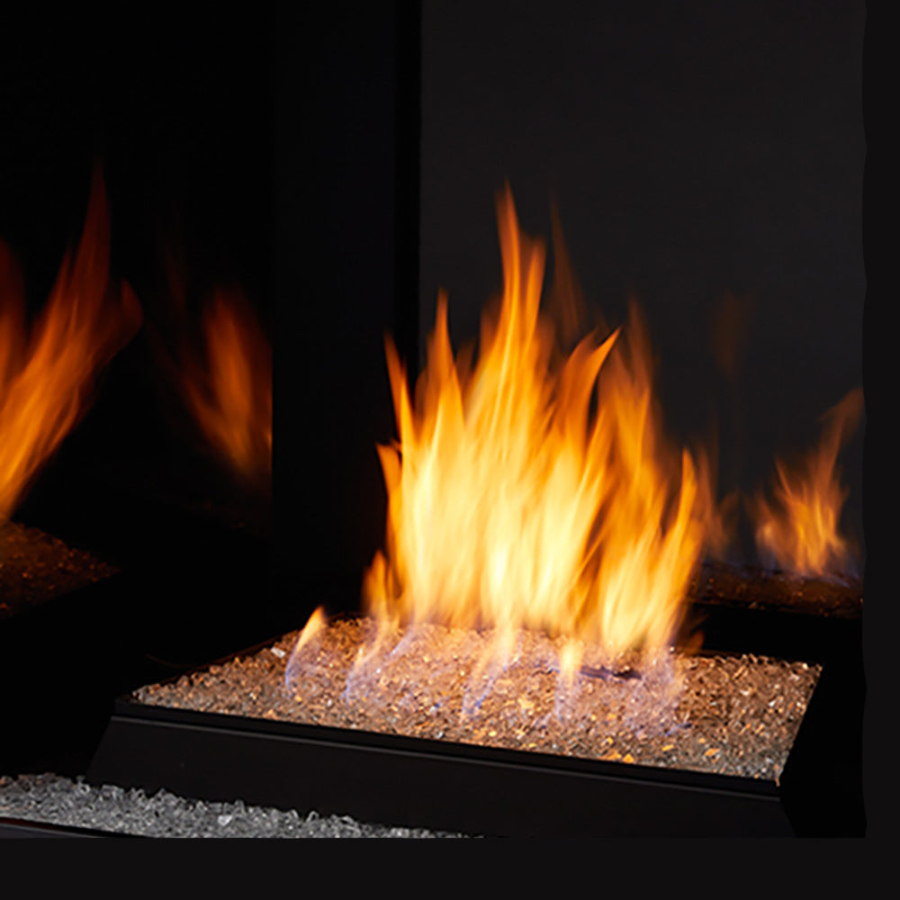 Vent-free gas burner with glowing flames over black firebox base and lava rocks