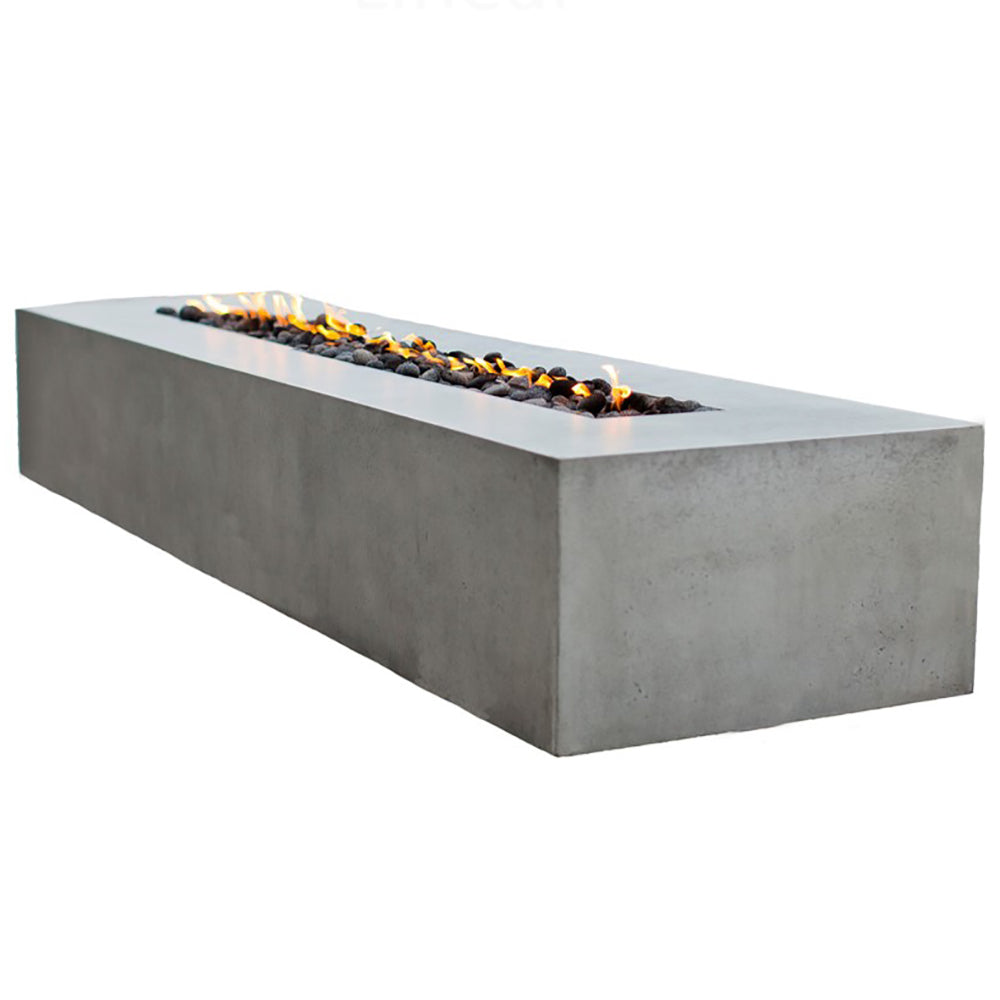 Grey GFRC linear fire pit table with rectangular bowl and visible burning fire