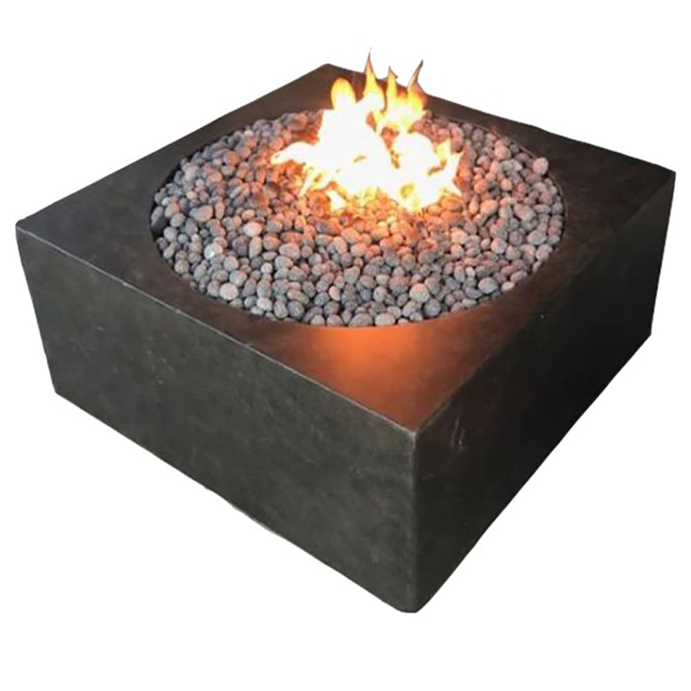 GFRC cube fire pit table with glowing flames and decorative fire glass in dark grey basin