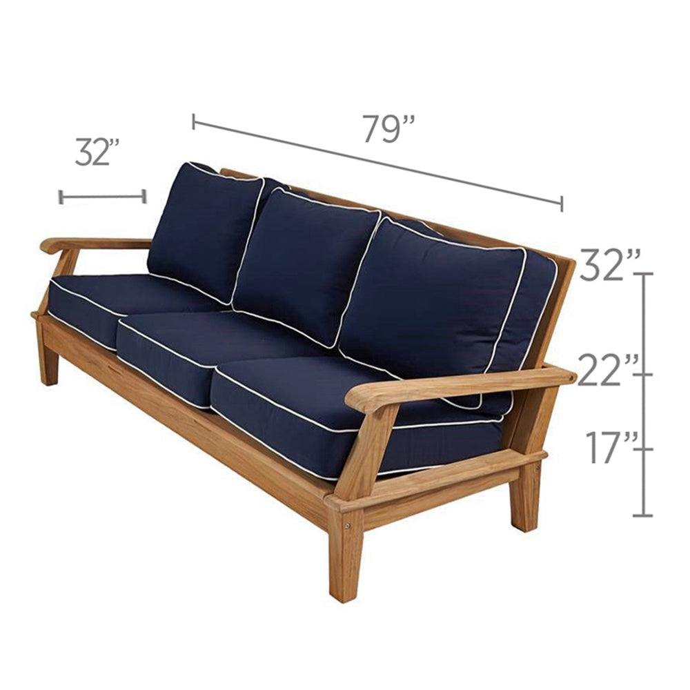 Teak outdoor loveseat with navy cushions and white piping, 79in long