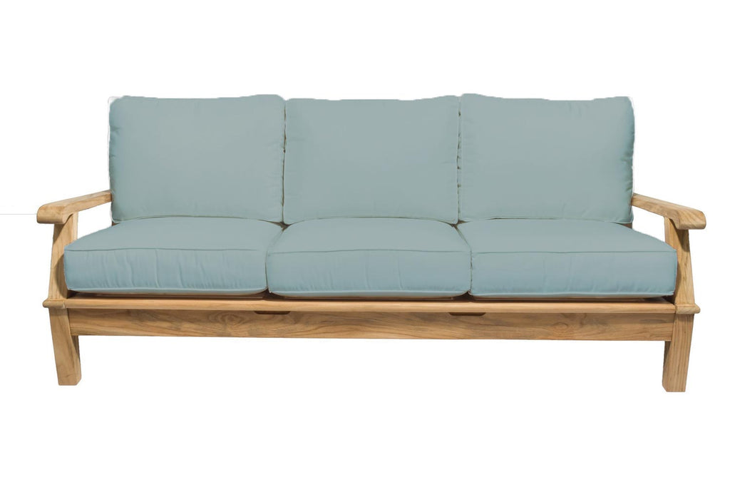 Teak outdoor sofa with light blue cushions and three back pillows
