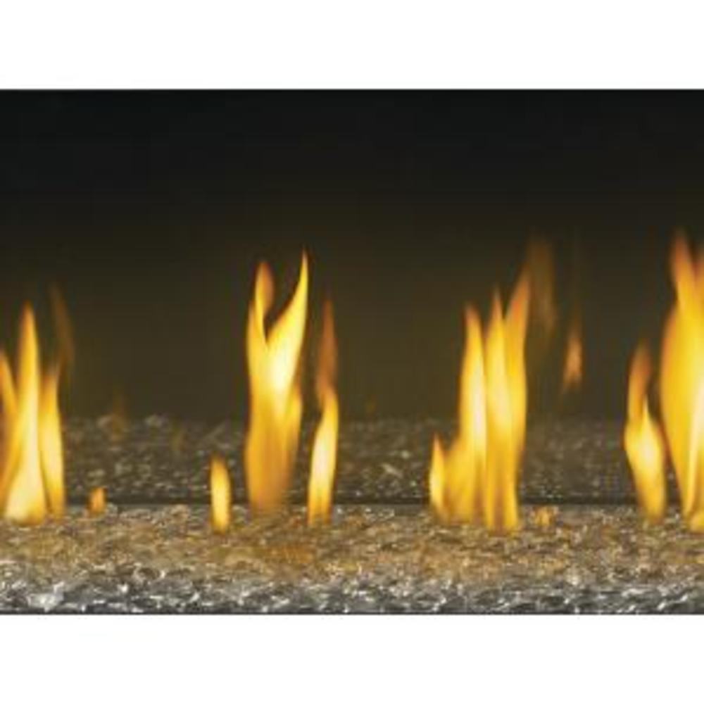 Fire flames burning in a bed of small stones