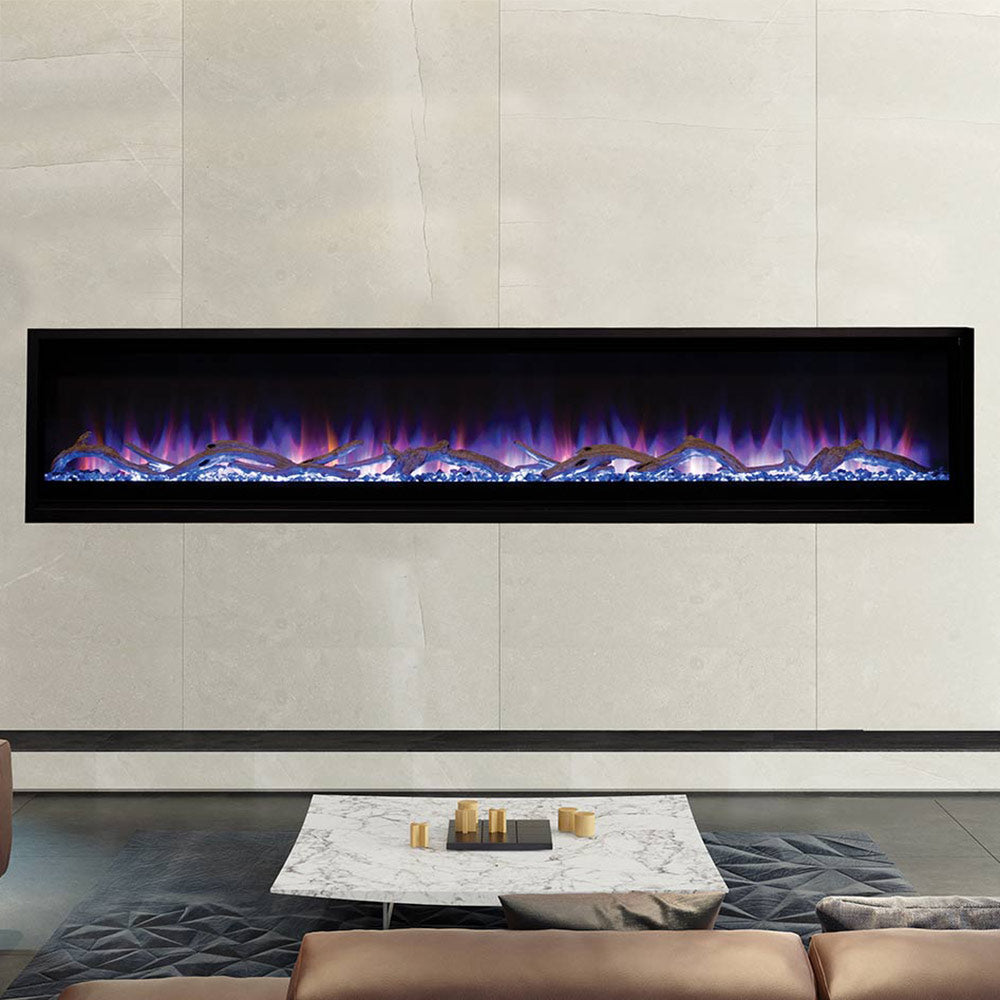 Linear electric fireplace with blue flame effect over smoked crystal ember bed