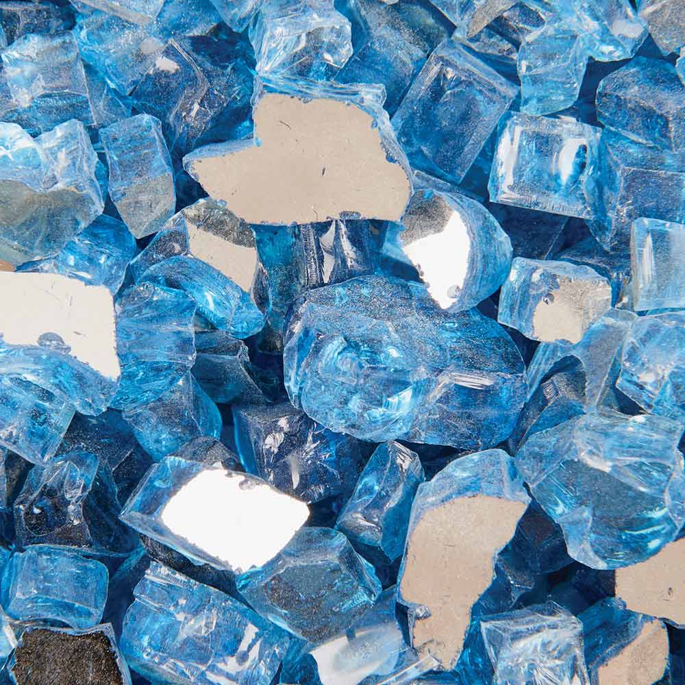 Reflective blue fire glass chunks with clear cut facets for fire pits