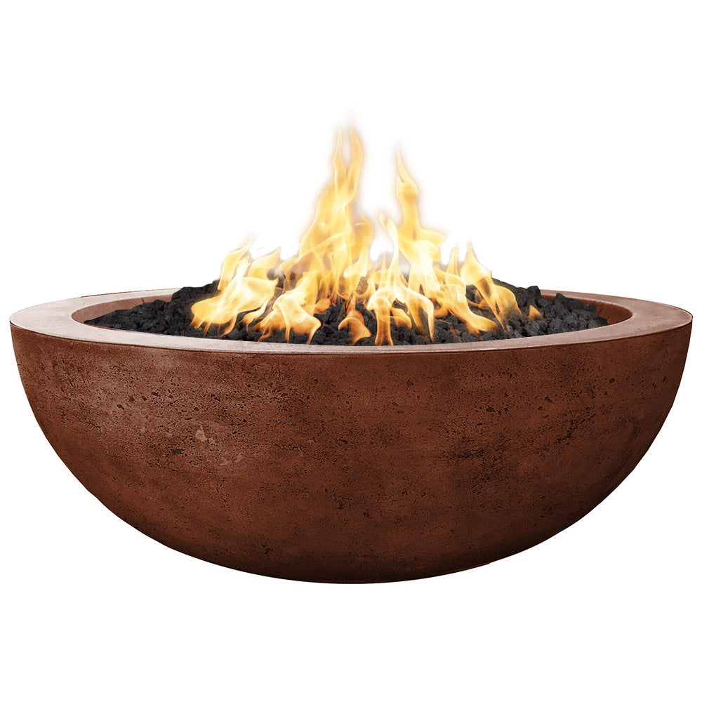 Concrete gas fire pit with rust-brown finish, flames, and black rock bed