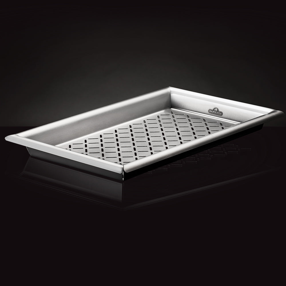 Stainless steel grill topper tray with perforated drip grid interior, corner cutouts