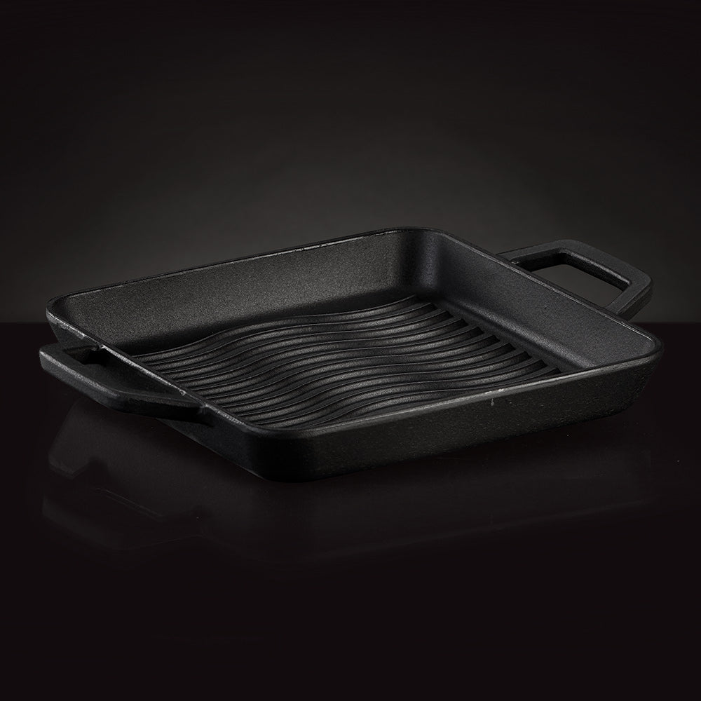 Square cast iron griddle with ridged interior and carry handle