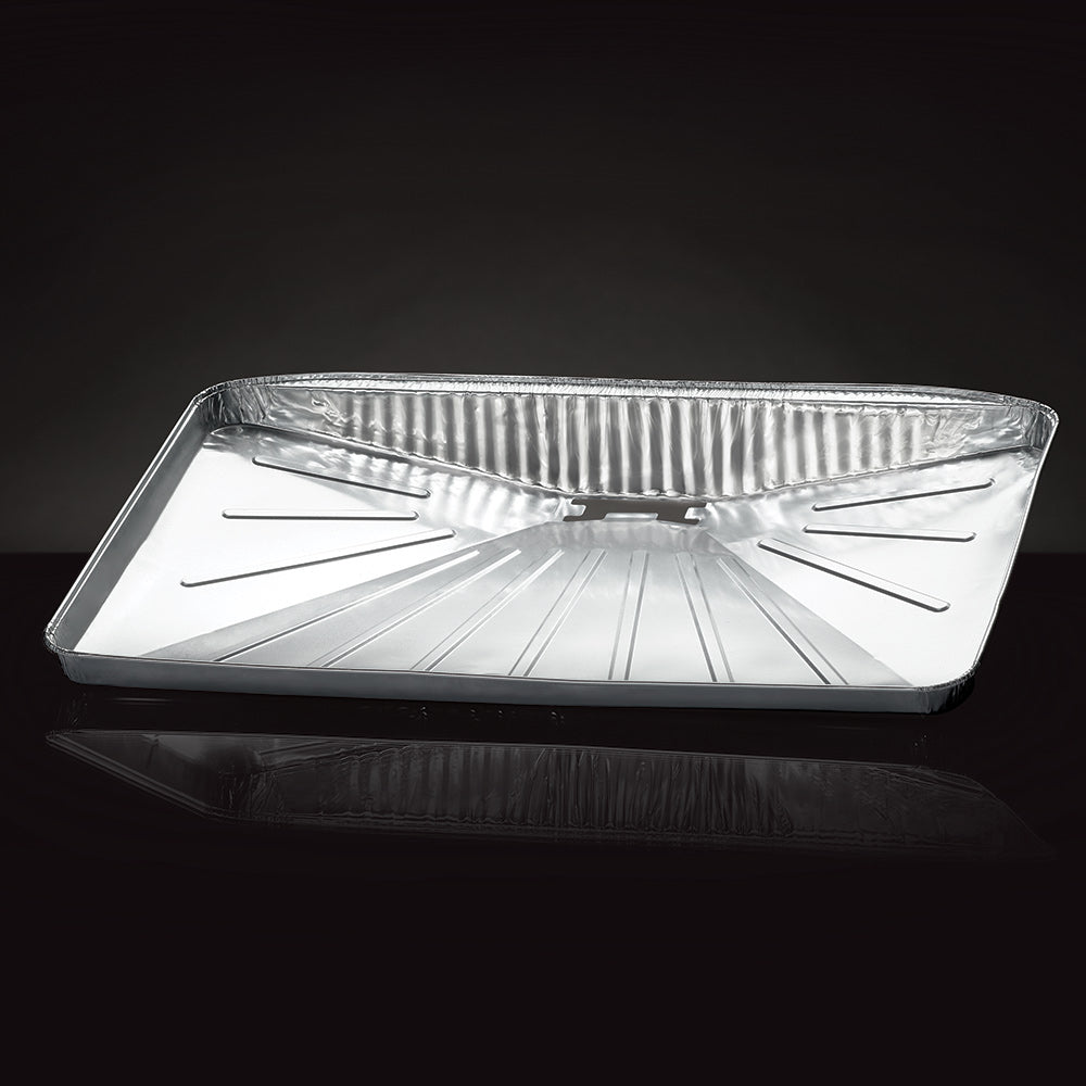 Silver rectangular grill drip pan liner with ribbed center and fold-in edges